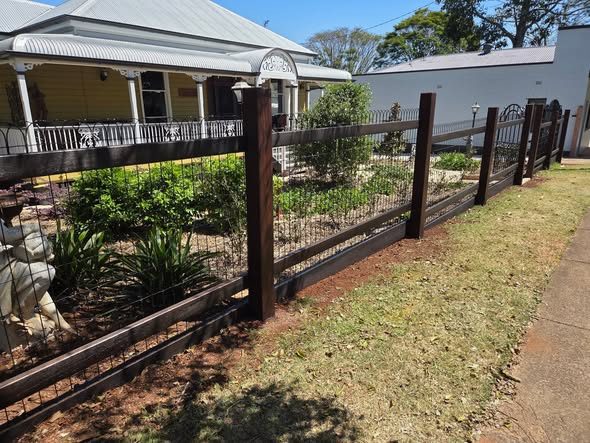 Timber post and decorative infill fence in front of a Toowoomba home